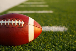 Close-up shot of a football on a field